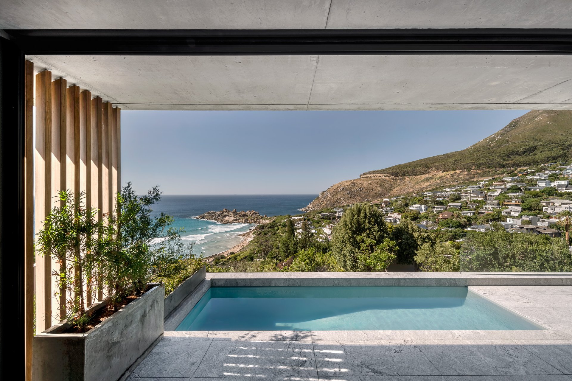 Interior architecture by TERRĀ in Cape Town, showing the studio's integration of joinery, lighting, and built-in detailing